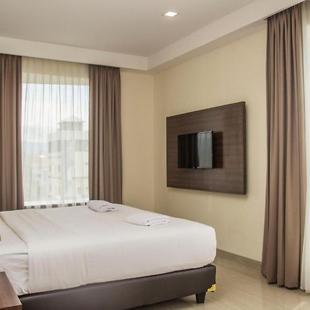 Green Eden Hotel Manado Kamer foto