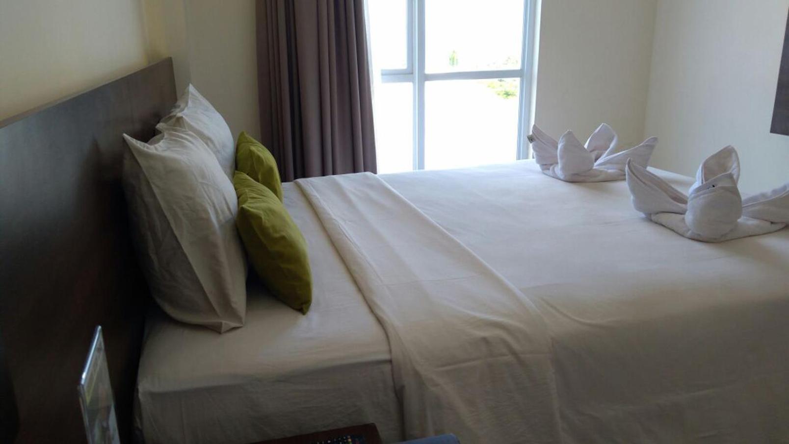 Green Eden Hotel Manado Kamer foto