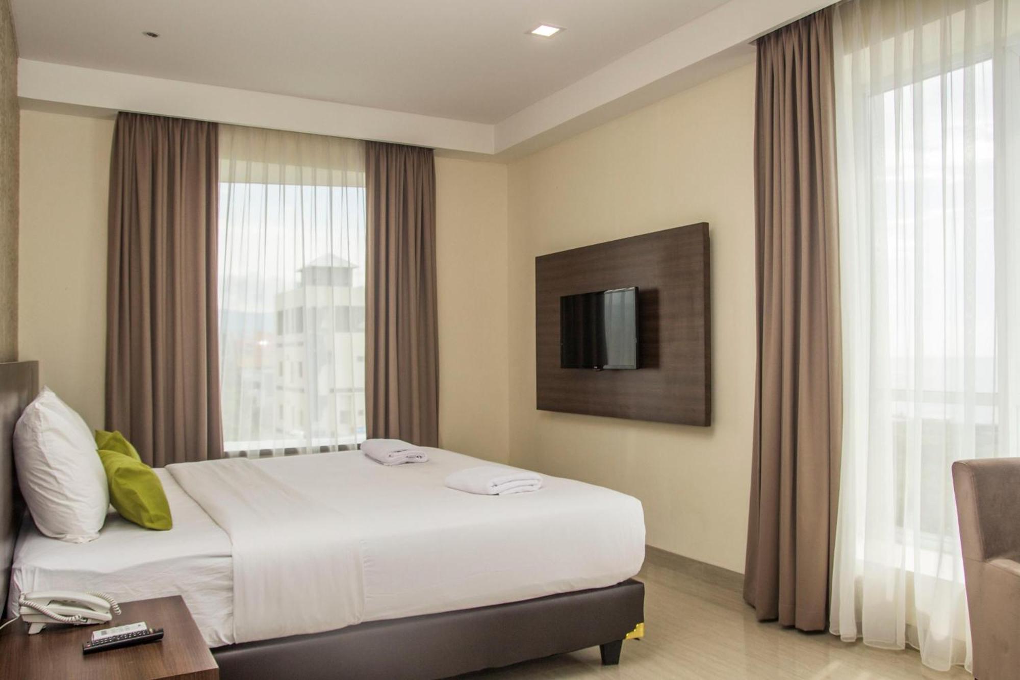 Green Eden Hotel Manado Kamer foto