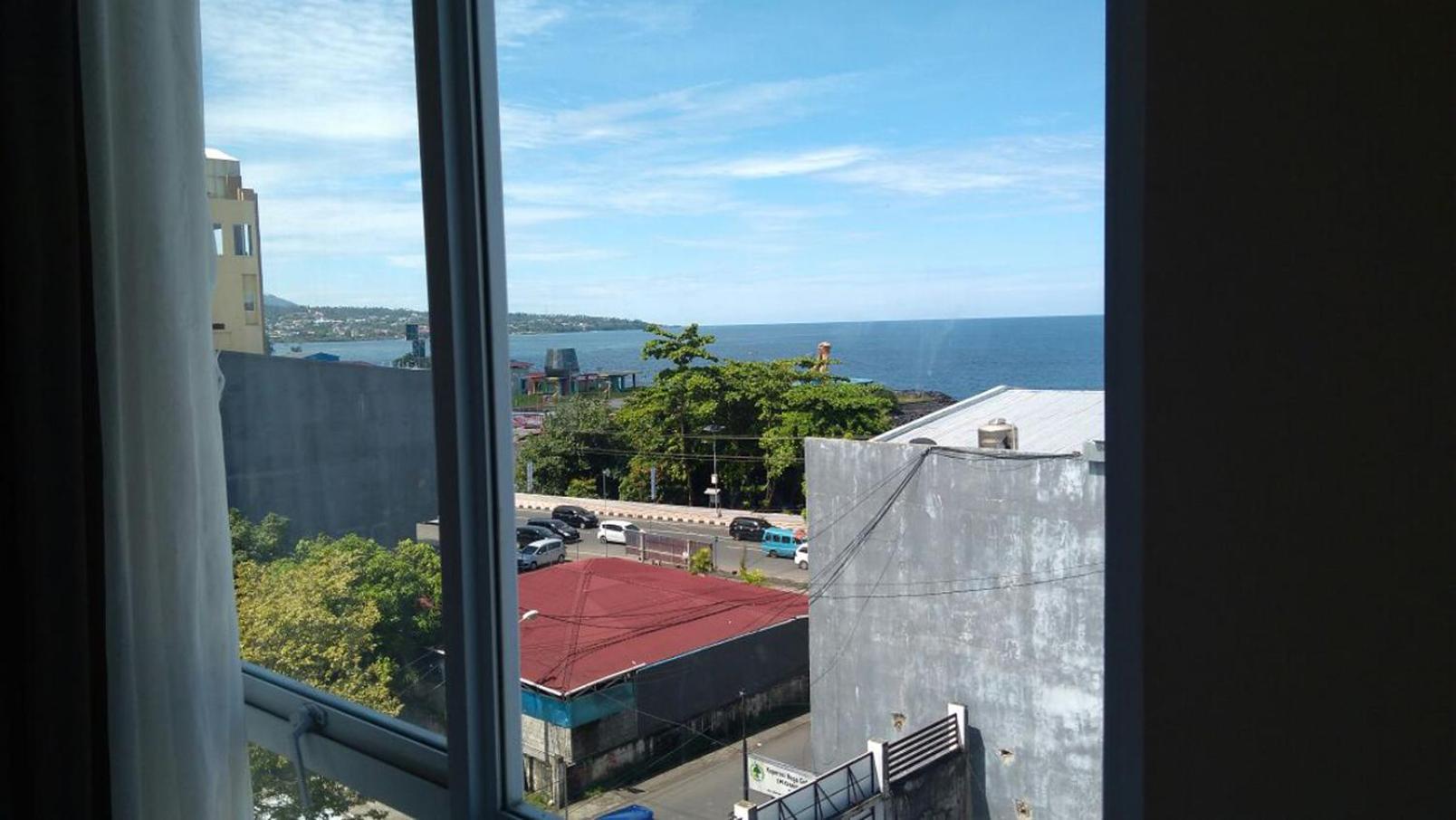 Green Eden Hotel Manado Kamer foto