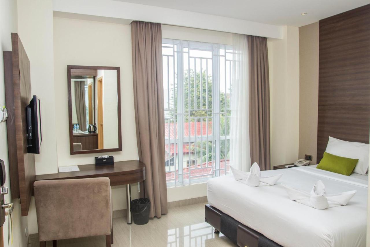Green Eden Hotel Manado Buitenkant foto