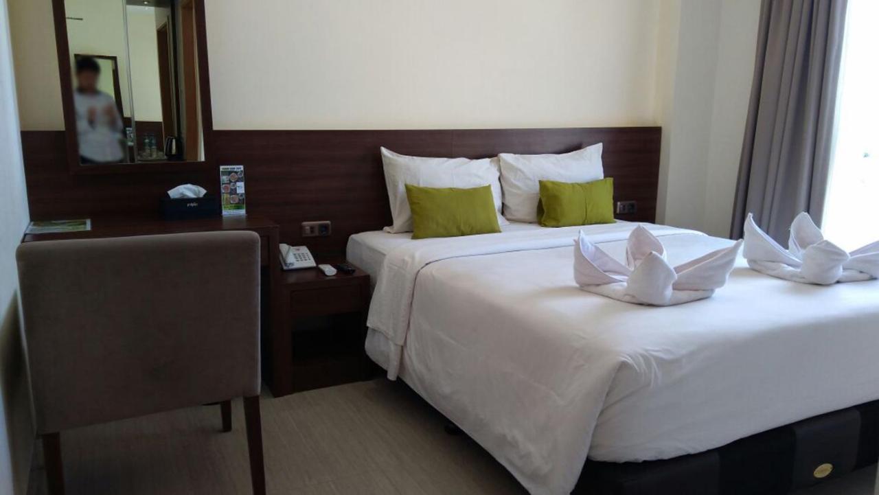 Green Eden Hotel Manado Kamer foto